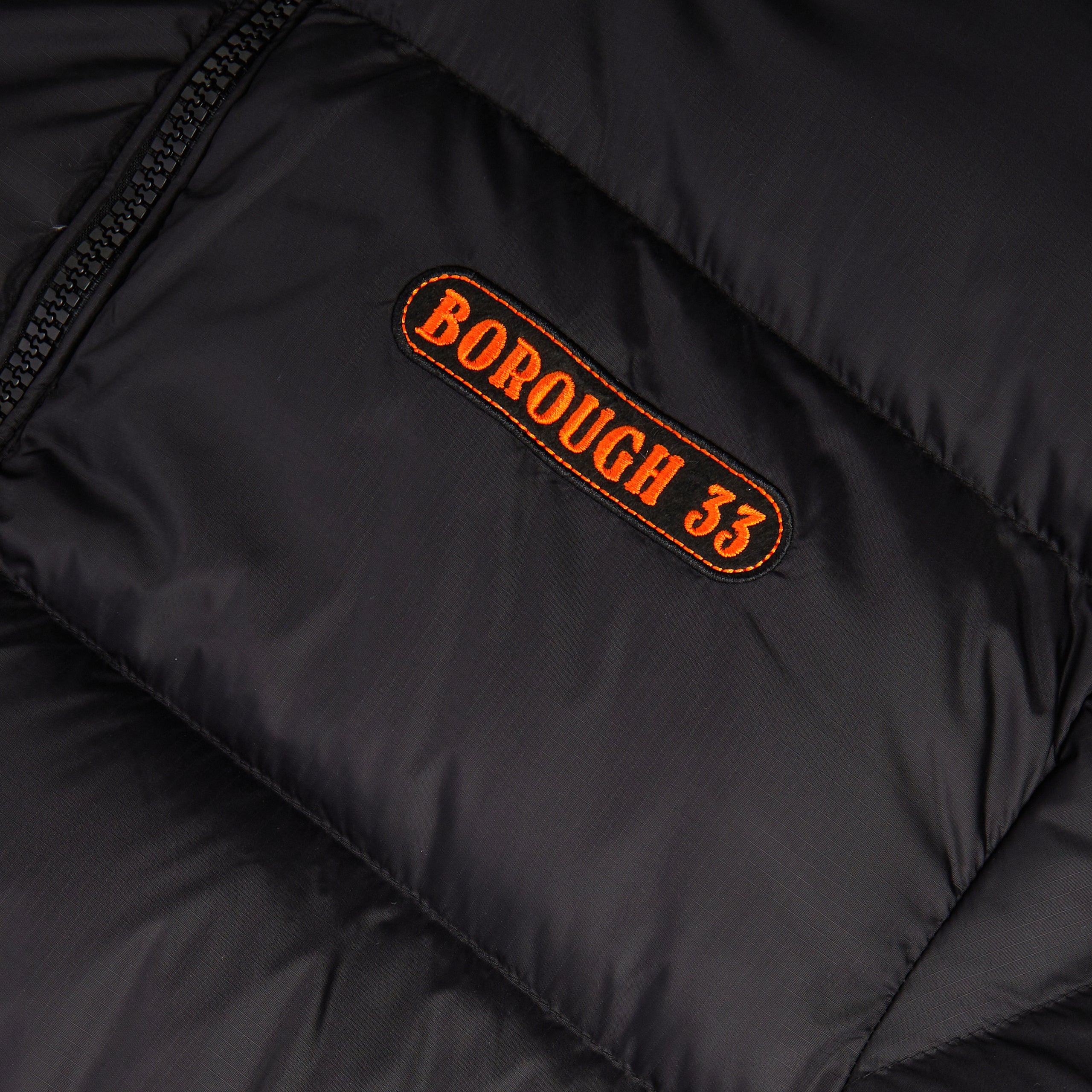 REVERSIBLE ACID DUCK PUFFER - BLACK